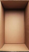 Open empty cardboard box presenting its interior space photo