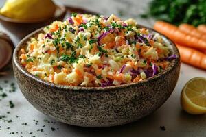 Coleslaw salad with cabbage, carrot, mayonnaise, and parsley topping in rustic bowl photo
