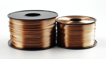 Copper wire spools sitting on white background photo