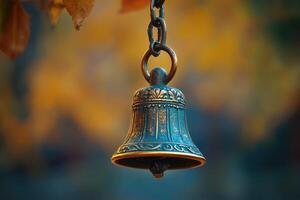 Small bell hanging on a chain creating a relaxing atmosphere photo