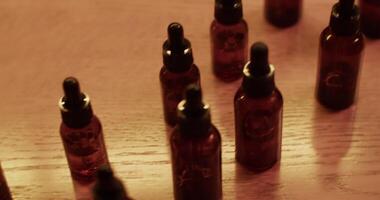 Bottles of various fragrant oils in lab video