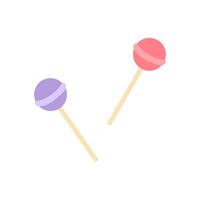 Colorful lollipops resting on a white surface during daytime vector