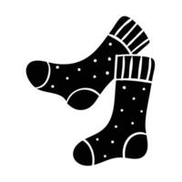 a pair of socks with polka dots on them vector