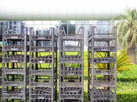 Stacked boxes on top of each other. Seedling boxes. Empty containers photo
