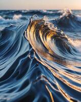 Fluid dynamics displayed in a stunning wave formation with a blend of dark and golden tones photo