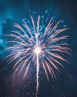 Fireworks on a dark blue gradient background photo