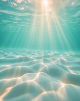 Sunlight streaming underwater creating serene ocean atmosphere photo