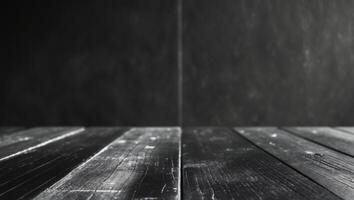 a close up of a wooden table with a black wall photo