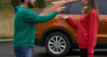 Car keys handshake, seller or car salesman and customer in a dealership, shake hands over the car keys photo