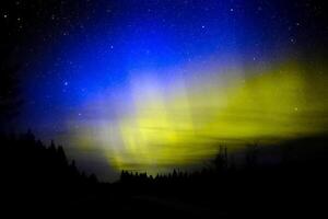 Aurora borealis colored in blue and yellow like the Ukrainian flag photo