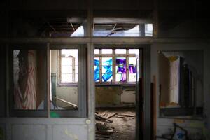 Ruined group rooms in an abandoned preschool in Germany photo