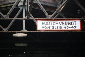 Sign at a former railway workshop in Germany. Rauchverbot von Gleis 40-47 means Smoking forbidden on tracks 40-47 photo