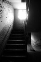 Black and white image of destroyed staircase photo