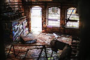 View over ruined factory interior full of debris photo