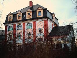 Ruined villa in Germany in dead winter shrubbery photo