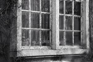 Vintage black and white shot of old window photo