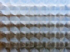 Looking through a structured bathroom glass pane photo
