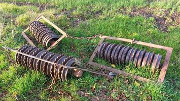 Set of cambridge rollers or cultipackers, typical agricultural devices photo