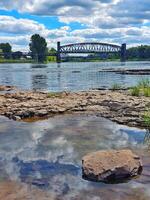 View from the Domfelsen lit. cathedral rocks in Magdeburg, Germany. This rock formation in the Elbe is only exposed in drought. photo