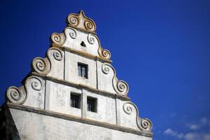 Facade detail of disused renaissance castle Grossmuehlingen in Germany photo