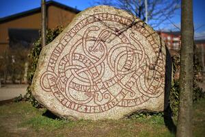 Ancient rune stone in Trelleborg in Sweden photo