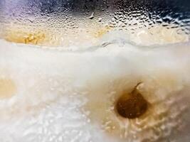 Ice water vapor outside the glass. Bubble pattern abstract background art design. Blurred background. photo