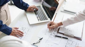 Architecture drawing on architectural project business architecture building construction Colleagues designer Planning Design on blueprint and compasses photo