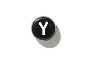 Minimalist black keyboard button with letter y on white background - symbol for technology and communication photo