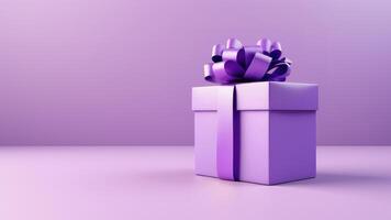 lilac gift box with purple bow on violet background and empty space photo