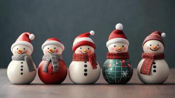 set of different porcelain snowmen on gray background. Ceramic Christmas toys figurines. photo