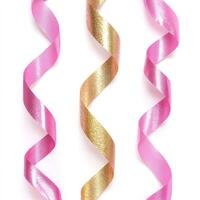 three shiny ribbons pink and gold isolated on a white background photo