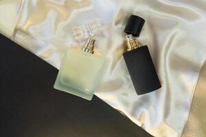 Flat lay composition with two perfume bottles photo