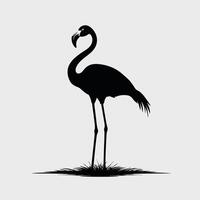 A black silhouette of a flamingo standing on the grass vector