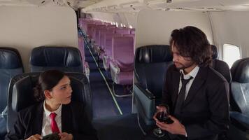 Corporate executive talk in empty plane video