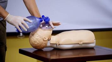 Medical simulation mannequin used for practicing techniques with oxygen mask. Healthcare and education. video
