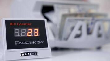 US dollar banknote in counting machine. Automatic mechanism for bank financial operations. video
