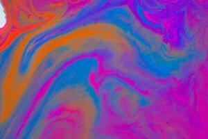 Multi-color paint drops and splotch on white background photo