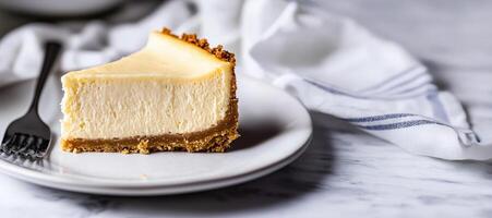 Classic cheesecake slice with graham cracker crust photo