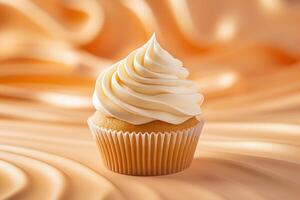 Delicious creamy cupcake with swirled frosting photo