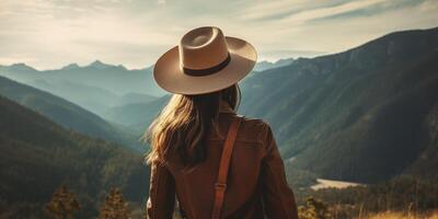 hiker overlooking scenic mountain landscape photo