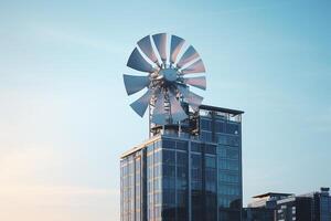 modern building with large wind turbine photo