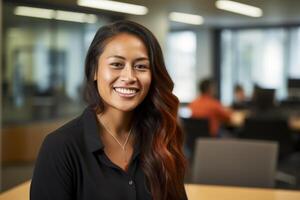Smiling young professional woman in office photo