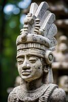 ancient mayan or aztec stone carving statue photo