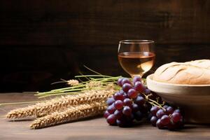 Still life with wine, bread, and grapes photo