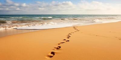 serene beach scene with footprints in the sand photo