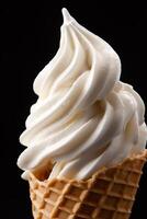 Creamy soft serve ice cream in waffle cone photo