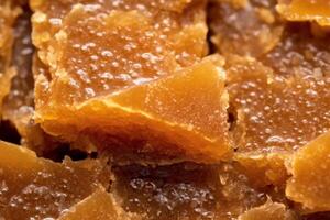 Delicious honeycomb with golden honey photo