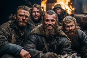 Rugged men with beards and weathered faces gathered around a campfire photo