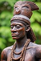 Detailed wooden tribal statue with intricate patterns and beaded necklace photo