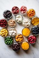 Assortment of colorful dietary supplements and vitamins photo
